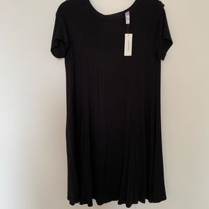 Francesca’s black shift dress